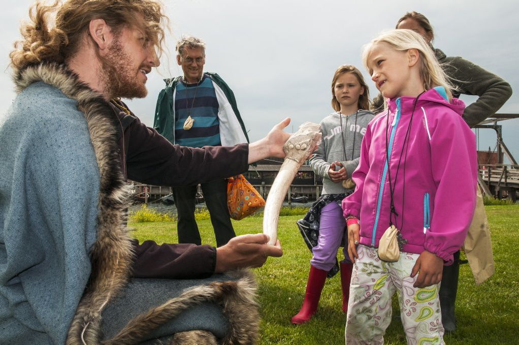 Meet the museum guide and hear about all the fascinating objects from the Viking Age. Copyright: The Viking Ship Museum in Roskilde