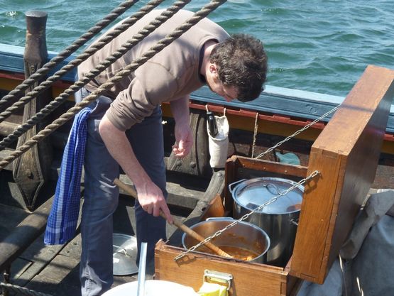 Gill Meller makes the  fish soup for the Sea Stallion's crew in the small galley on the Sea Stallion.