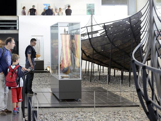 Guided tours: on racing bikes and longships at the Viking Ship Museum. Guided tours: on racing bikes and longships at the Viking Ship Museum.