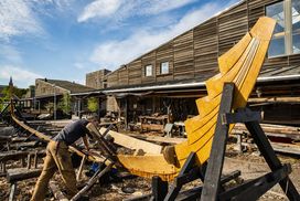 Boat builders working on Skuldelev 5 in the beautiful weather