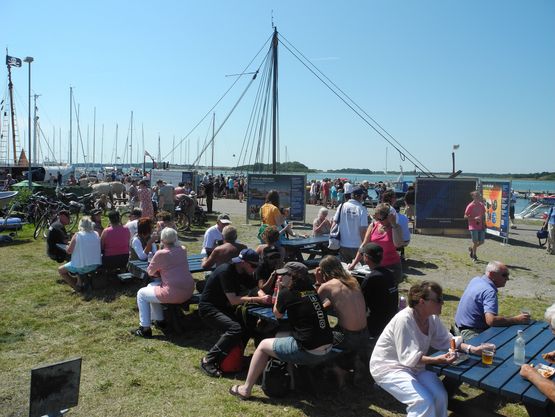 Langør port on the island of Samsø 24 July. In the Background the mobile exhibition and the Sea Stallion.