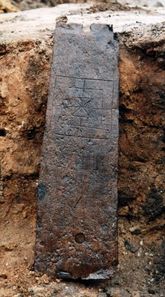 This deck plank was reused in a well lining. On the plank, nine men's morris is engraved. Photo: Hans Skov. Moesgård Museum.