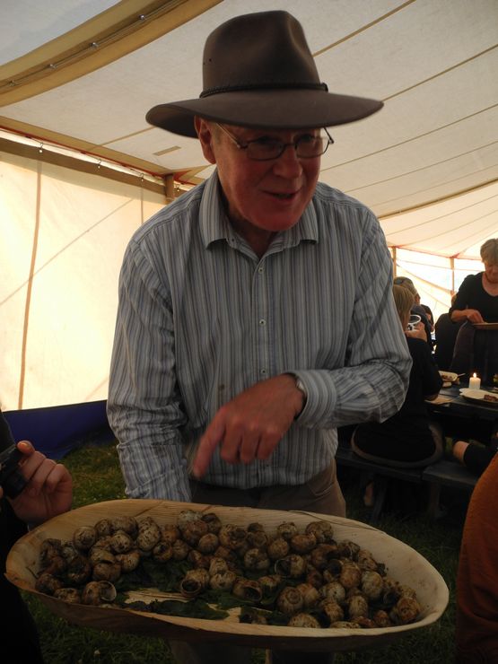 John Wright, herbal and mushroom expert from River Cottage, offers snails and sea kale during the Viking feast.