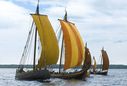 The five Viking ship reconstructions in durring a sailingtrip on the fjord. Photo Werner Karrasch
