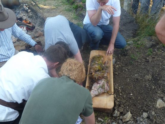 The lamb roast was dug up after 7 hours in the pit, which functions as an earth oven.