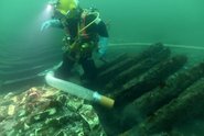 Marinarkæolog dykker på skibsfund. Copyright Vikingeskibsmuseet i Roskilde.
